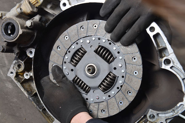 The friction material on a clutch disk can wear out, leading to clutch slip