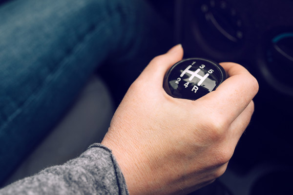 Trouble shifting into reverse could signify a problem with a car's clutch