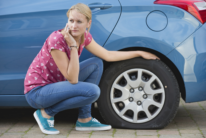 Changing a flat tire is a must-know for automotive service technicians