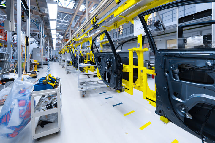 A production line of auto parts being prepared for installation in a manufacturing facility